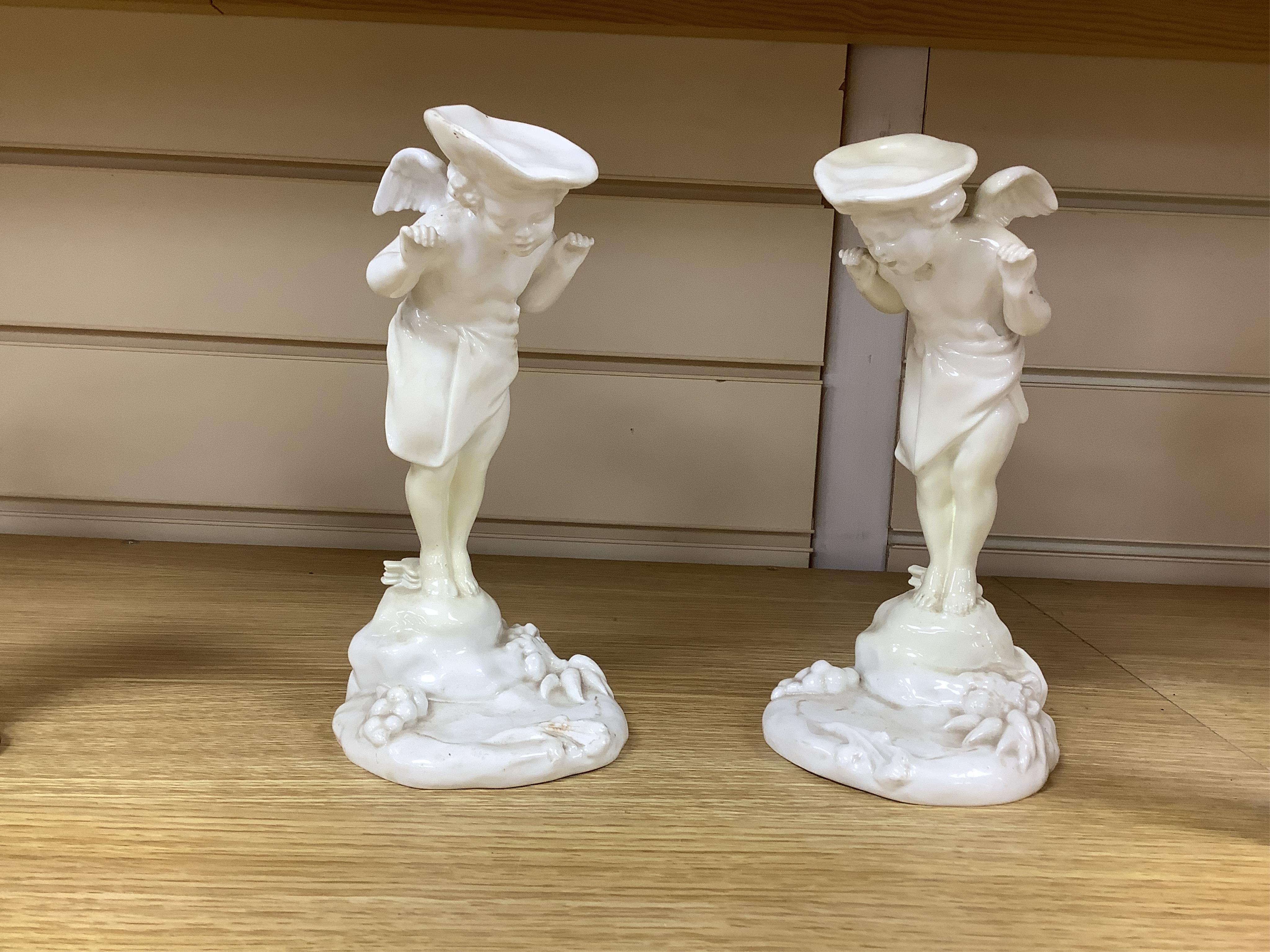 A pair of 19th century Mintons white glazed porcelain figural menu holders, 20cm